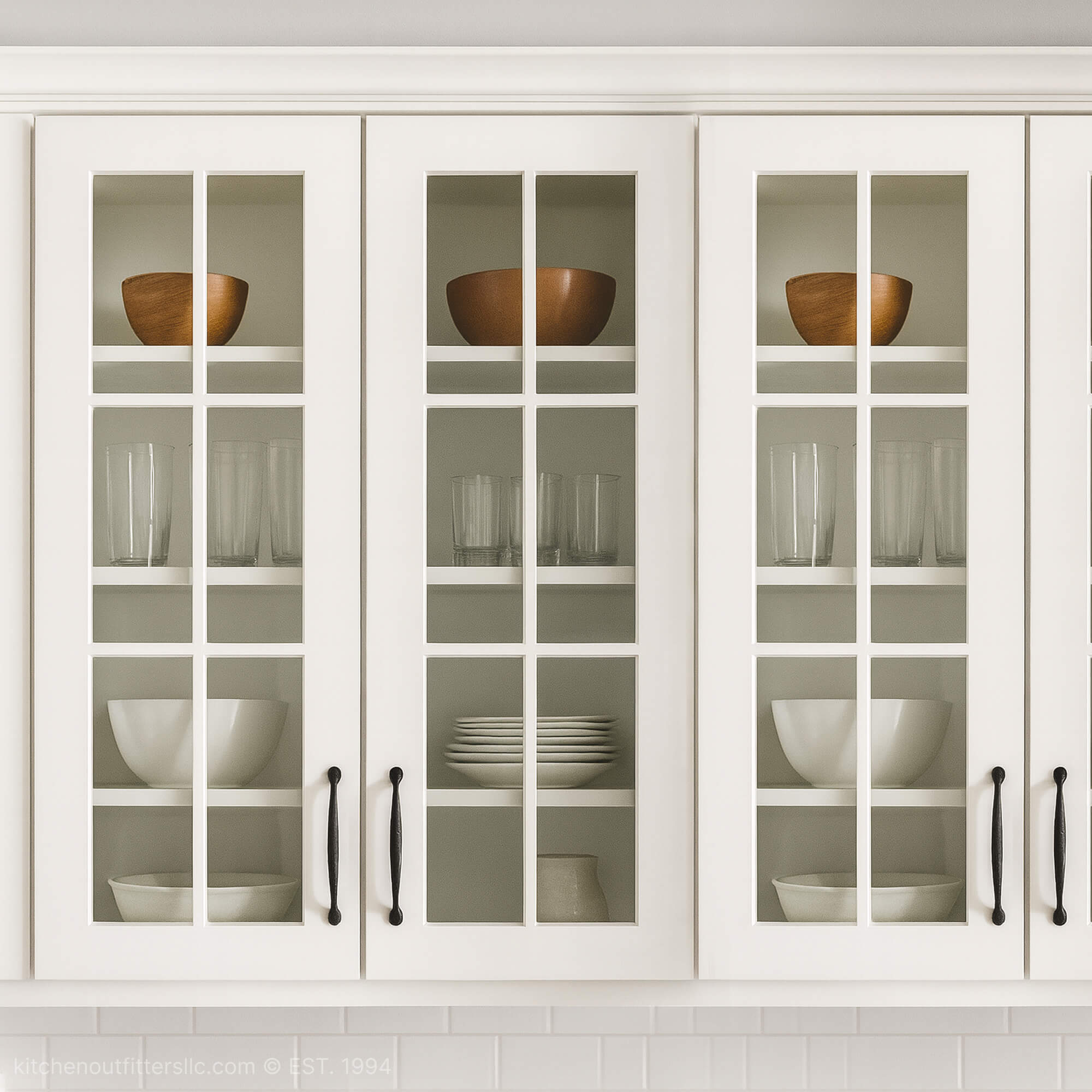 White kitchen cabinets with 6-light grid mullion glass doors featuring divided glass panels and classic design