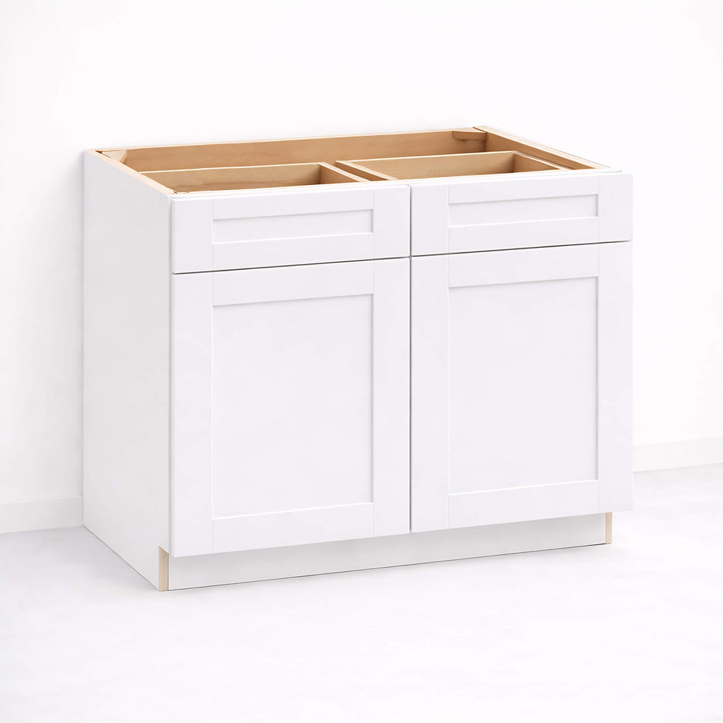 Base cabinet with two closed Shaker doors and one top drawer, 34 1/2 inch height and 24 inch depth, white painted finish, standard base cabinet configuration.