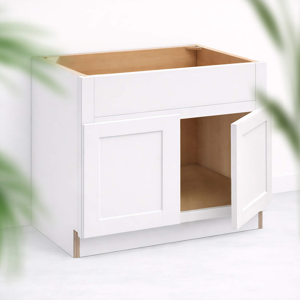 Farmhouse sink base cabinet with double Shaker doors partially open and apron front opening, 34 1/2 inch height and 24 inch depth.