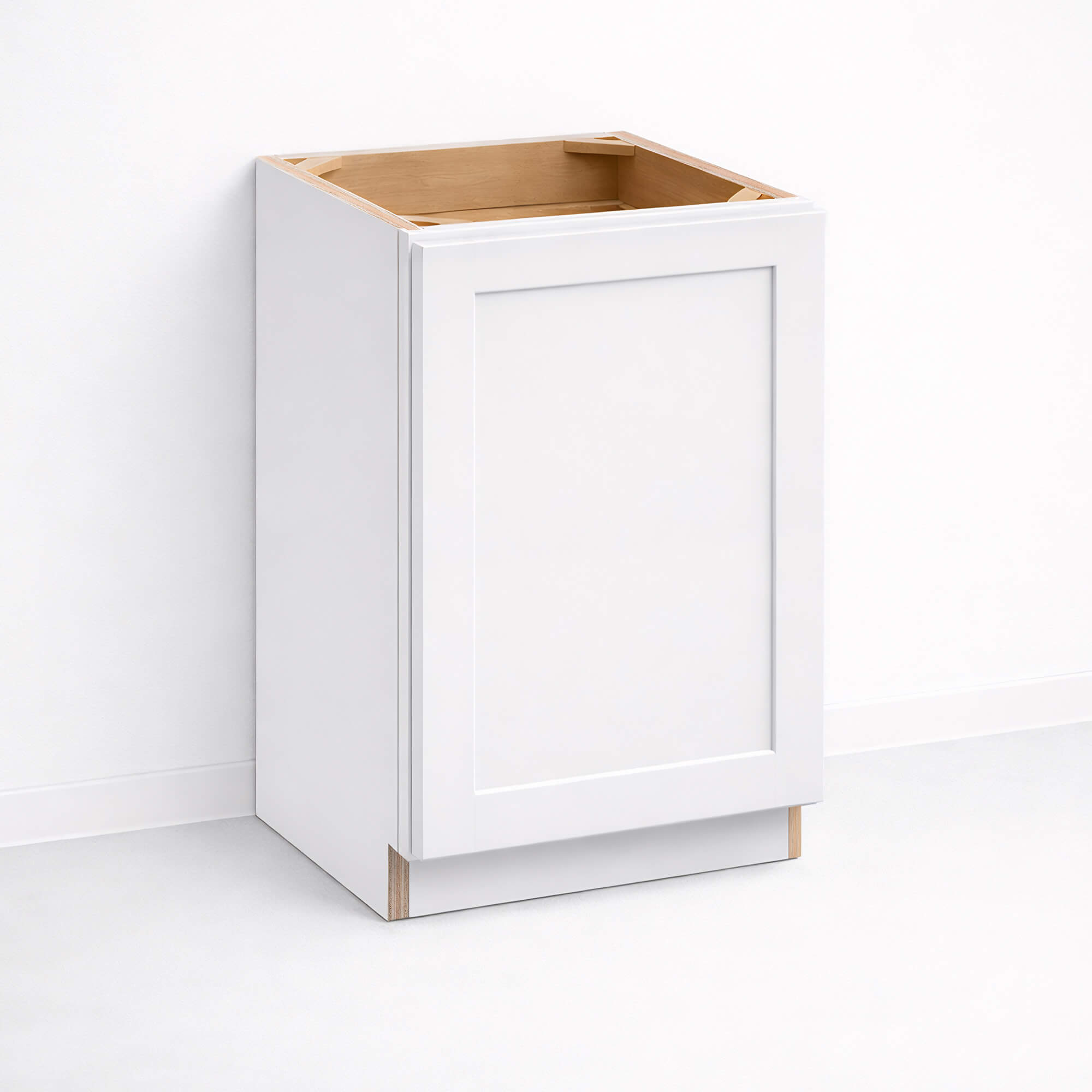 Base cabinet with single closed Shaker door, 34 1/2 inch height and 24 inch depth, white painted finish.