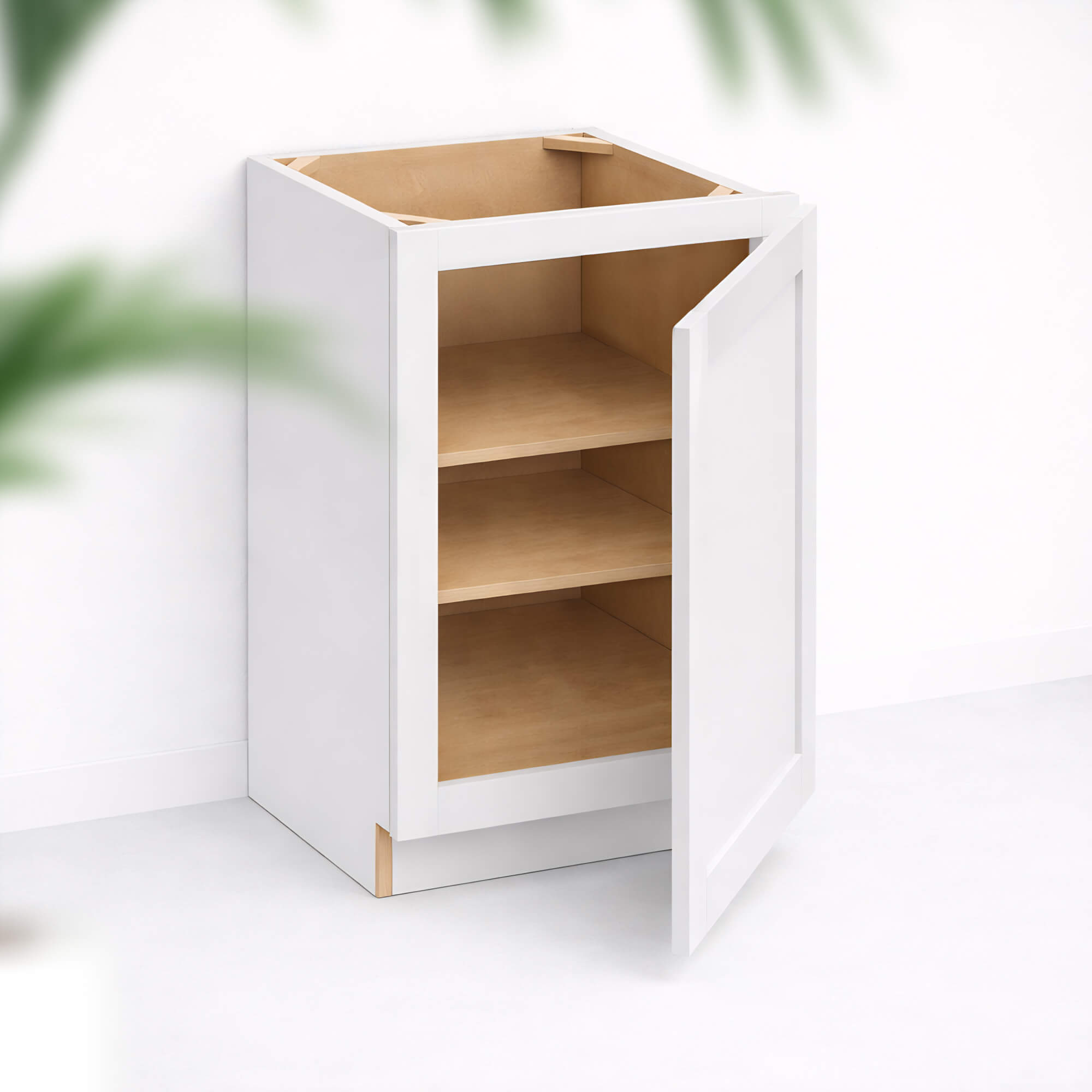 Base cabinet with single Shaker door partially open, 34 1/2 inch height and 24 inch depth, white finish, standard base configuration.