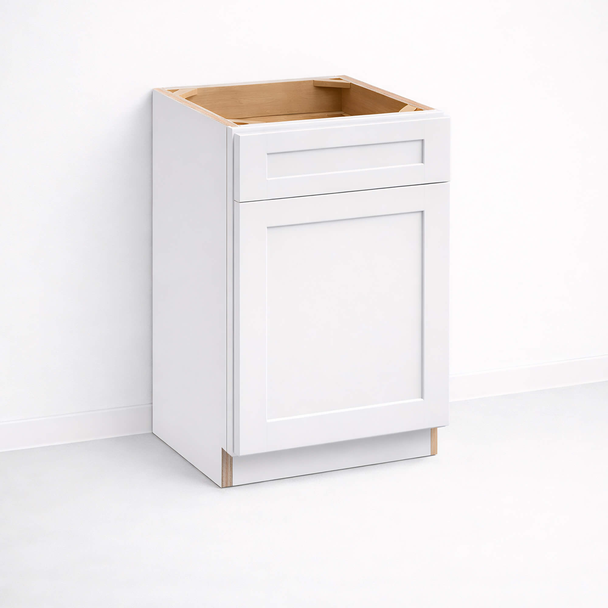 Base cabinet with one top drawer and one closed Shaker door, 34 1/2 inch height and 24 inch depth.