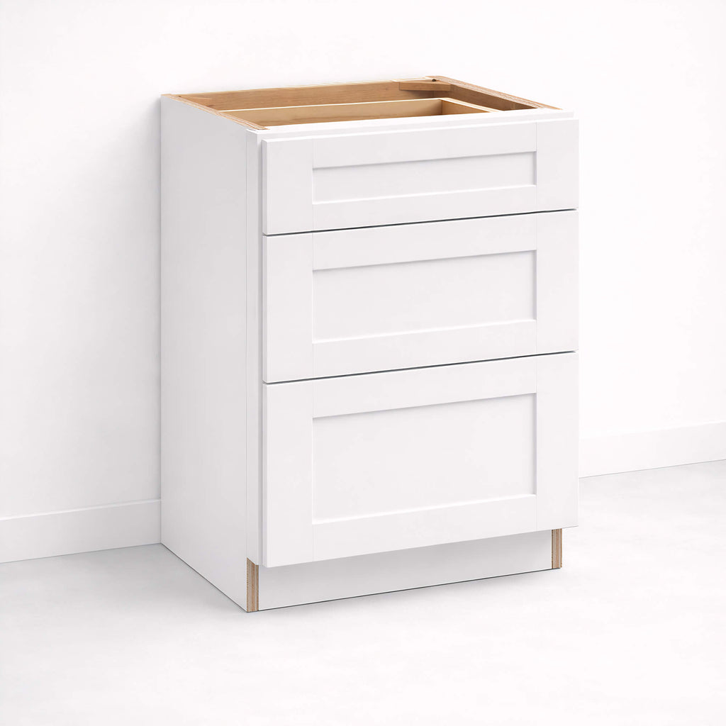 Base cabinet with three closed Shaker style drawers, 34 1/2 inch height and 24 inch depth.