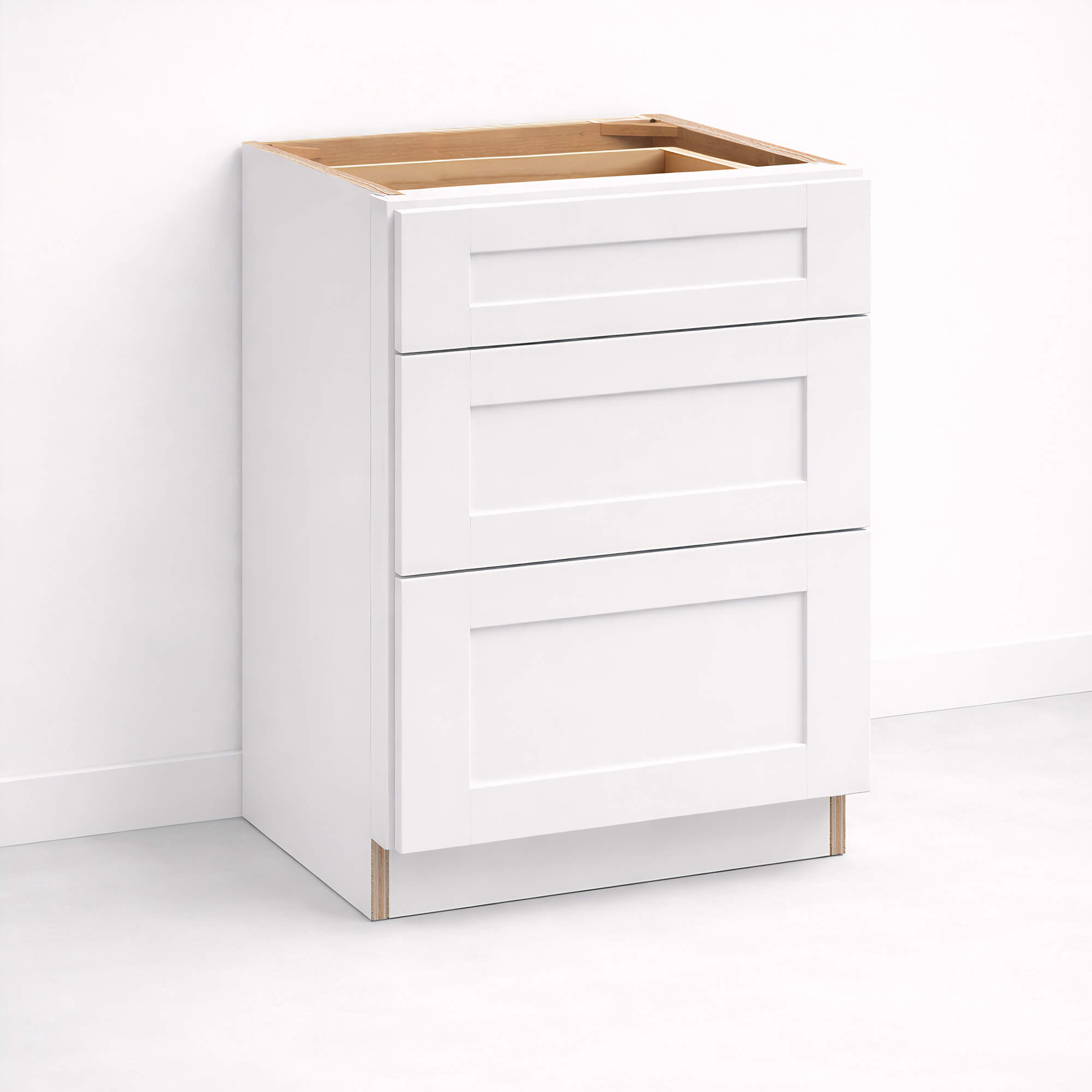Base cabinet with three closed Shaker style drawers, 34 1/2 inch height and 24 inch depth.