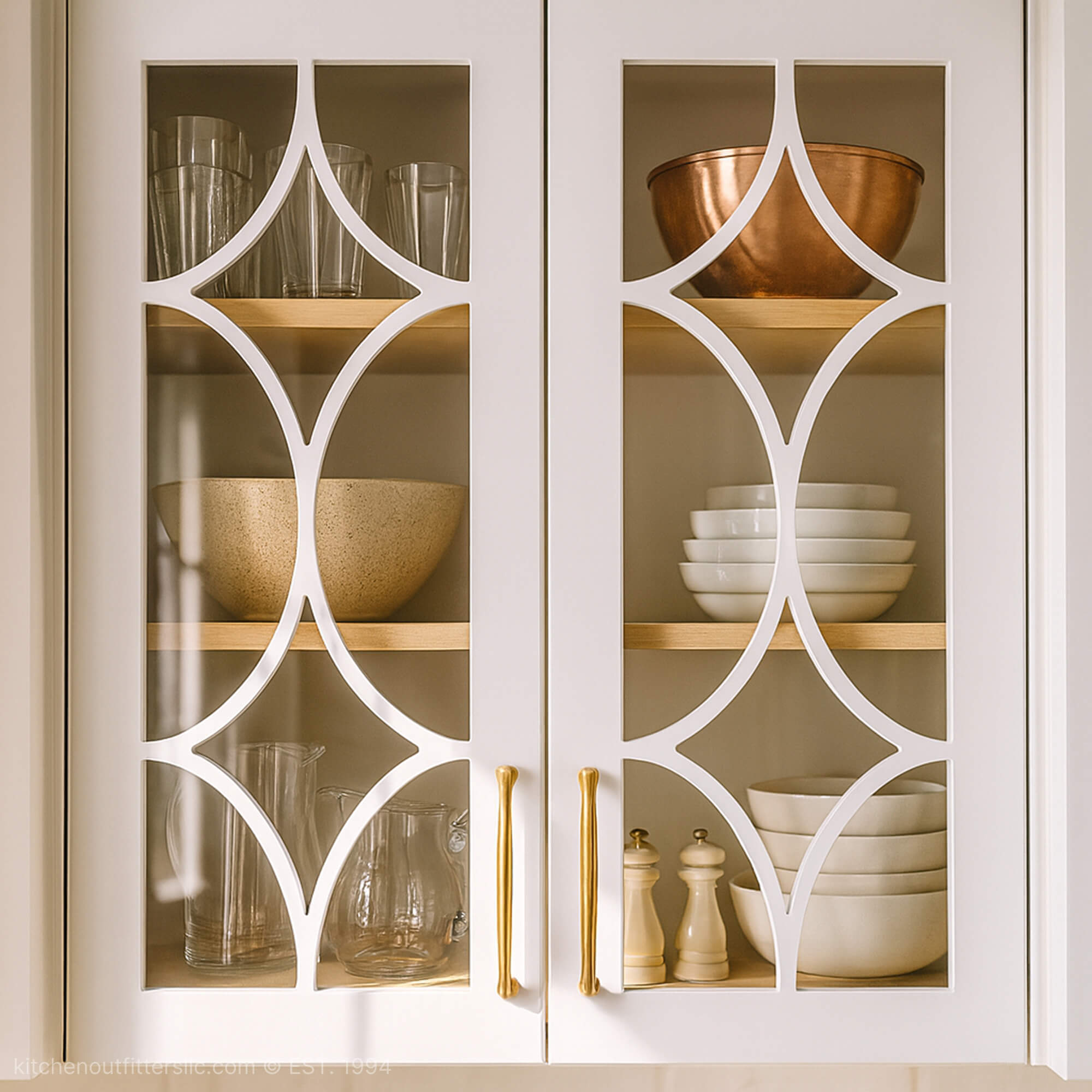 White kitchen cabinet with diamond swag mullion glass doors featuring elegant curved grid design and glass inserts